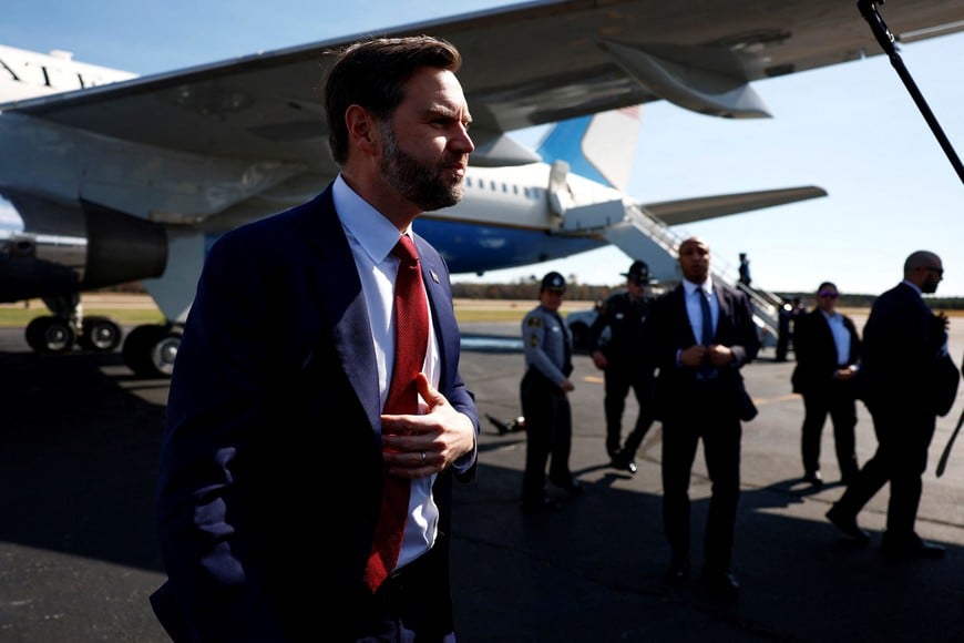 U.S. Vice President JD Vance prepares to board Air Force Two en route to Washington, D.C., at Rocky Mount-Wilson Regional Airport, in Elm City, North Carolina. U.S., March 13, 2026. Kent Nishimura/Pool via REUTERS