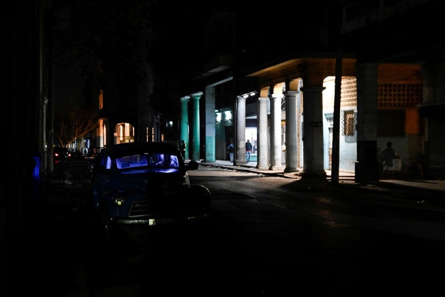 A vintage car is parked on a street as Cuban President Miguel Diaz-Canel said the country has opened talks with the U.S. government amid an oil blockade imposed by U.S. President Donald Trump that is pushing the Communist-run nation deeper into economic crisis, in Havana, Cuba, March 13, 2026. REUTERS/Norlys Perez