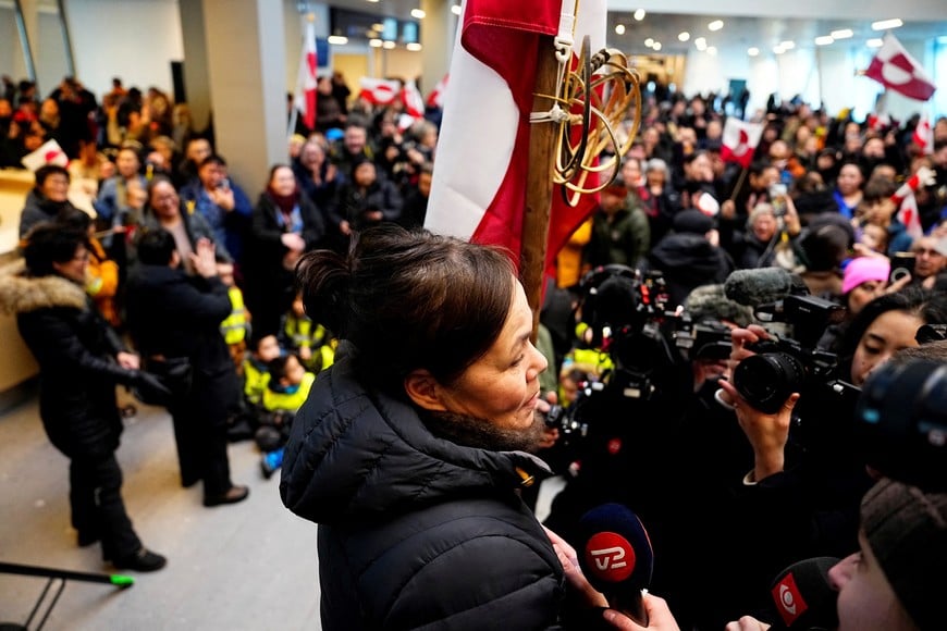 Greenland's Minister for Foreign Affairs, Vivian Motzfeldt speaks to the press upon arrival at Nuuk airport, Greenland, January 20, 2026.   Ritzau Scanpix/Mads Claus Rasmussen via REUTERS ATTENTION EDITORS - THIS IMAGE WAS PROVIDED BY A THIRD PARTY. DENMARK OUT. NO COMMERCIAL OR EDITORIAL SALES IN DENMARK.