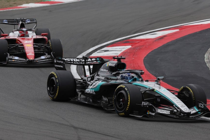 Formula One F1 - Chinese Grand Prix - Shanghai International Circuit, Shanghai, China - March 15, 2026
Mercedes' George Russell and Ferrari's Charles Leclerc in action during the race REUTERS/Go Nakamura