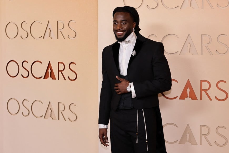Shaboozey poses on the red carpet during the Oscars arrivals at the 98th Academy Awards in Hollywood, Los Angeles, California, U.S., March 15, 2026. REUTERS/Daniel Cole