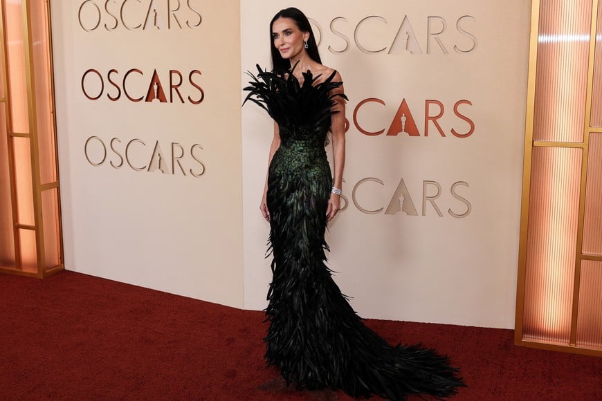 Demi Moore poses on the red carpet during the Oscars arrivals at the 98th Academy Awards in Hollywood, Los Angeles, California, U.S., March 15, 2026. REUTERS/Daniel Cole
