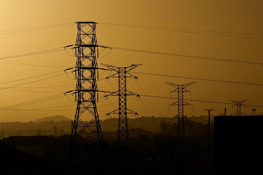 FILE PHOTO: High tension electrical wires as Cuba brought its national electrical grid back online after the country had been largely without power for 16 hours in an outage that Energy Ministry officials linked to the oil blockade of Cuba imposed by the United States, in Havana, Cuba, March 5, 2026. REUTERS/Norlys Perez/File Photo