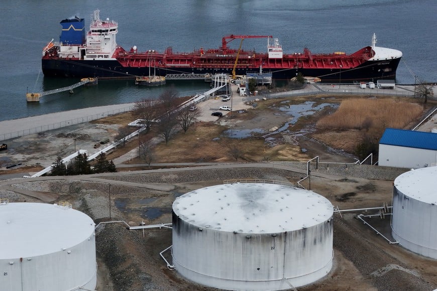 A drone view shows the Portuguese flagged oil and chemical tanker ship CB Pacific docked at the Moran Shipping Agencies’ Citgo Petroleum Quincy/Braintree Terminal, which according to the company handles home heating oil, gasoline and diesel, after the CB Pacific arrived from Quebec, Canada to Braintree, Massachusetts, U.S., March 18, 2026.   REUTERS/Brian Snyder