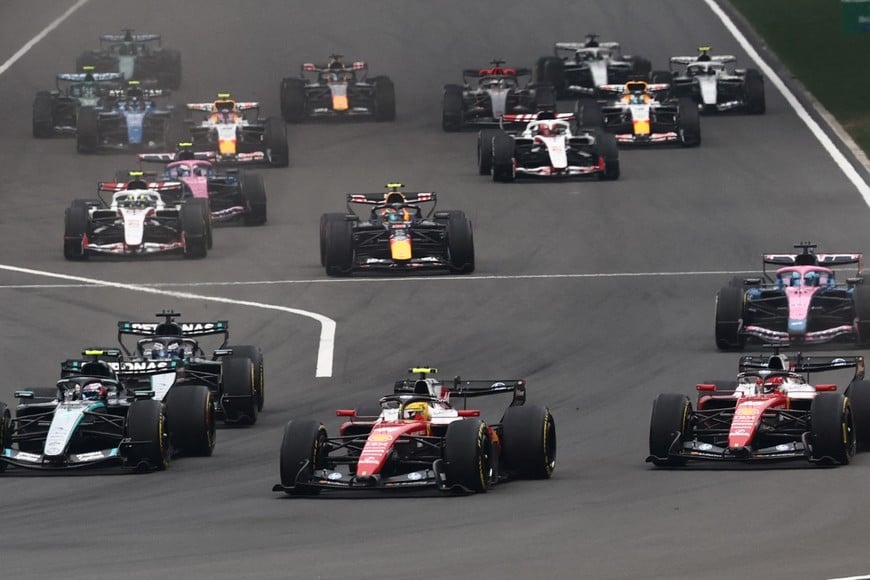 Formula One F1 - Chinese Grand Prix - Shanghai International Circuit, Shanghai, China - March 15, 2026
Ferrari's Lewis Hamilton, Mercedes' Andrea Kimi Antonelli, Ferrari's Charles Leclerc, Mercedes' George Russell, Alpine's Pierre Gasly, Red Bull's Isack Hadjar, Haas' Oliver Bearman, Alpine's Franco Colapinto and drivers in action at the start of race REUTERS/Jakub Porzycki