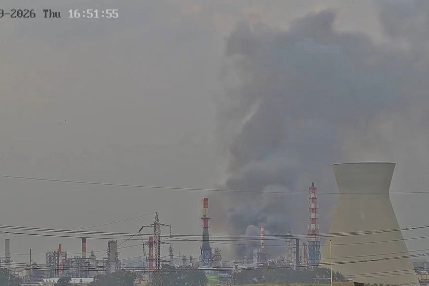 CCTV footage shows smoke rising from Israel's Haifa refinery after a reported Iranian attack, in Haifa, Israel, March 19, 2026, amid the U.S.-Israeli conflict with Iran, in this screengrab from video obtained from social media. Social Media/via REUTERS  THIS IMAGE HAS BEEN SUPPLIED BY A THIRD PARTY. MANDATORY CREDIT. NO RESALES. NO ARCHIVES. TIMESTAMP OVERLAY FROM SOURCE.

VERIFICATION:
- Reuters verified the location by the buildings and structures in the refinery, which matched satellite and file imagery to coordinates 32.79421502655376, 35.04339973693372. 
- The date was verified by Israel's Energy Ministry reports of an Iranian missile attack on Thursday at Israel's Oil Refineries in the northern port city of Haifa.