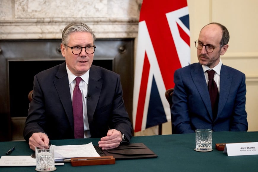 British Prime Minister Kier Starmer holds a roundtable meeting with writer Jack Thorne at Number 10 Downing Street in London, Britain, March 31, 2025. Prime Minister Keir Starmer is hosting a roundtable on adolescent safety with the creators of the television show 'Adolescence,' in discussion with charities and young people about issues raised in the show. Jack Taylor/Pool via REUTERS