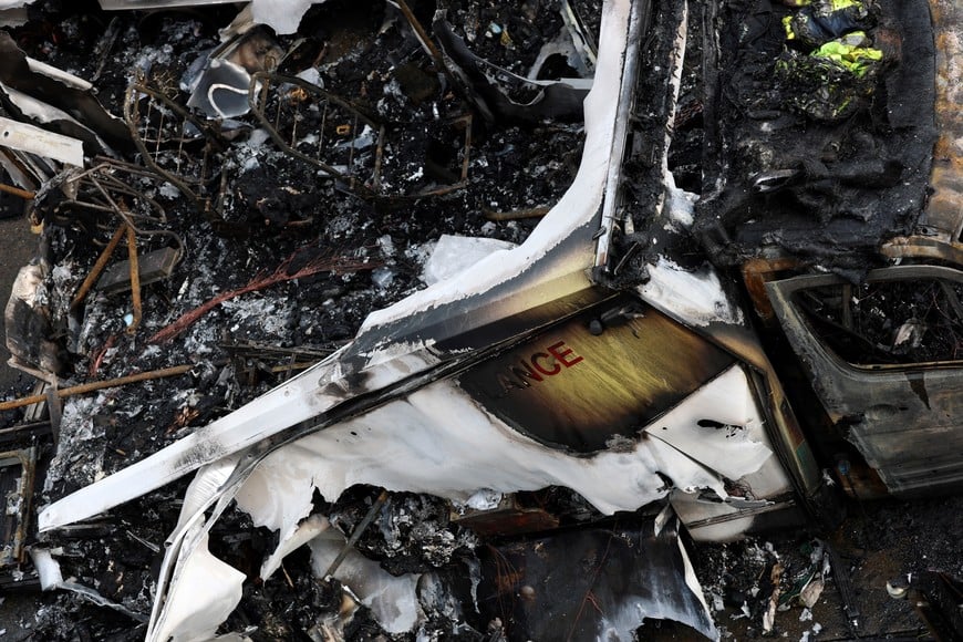 Charred remains of ambulances belonging to Hatzola, a Jewish community organisation, which were set on fire in an incident that the police say is being treated as an antisemitic hate crime, in northwest London, Britain, March 23, 2026. REUTERS/Hannah McKay