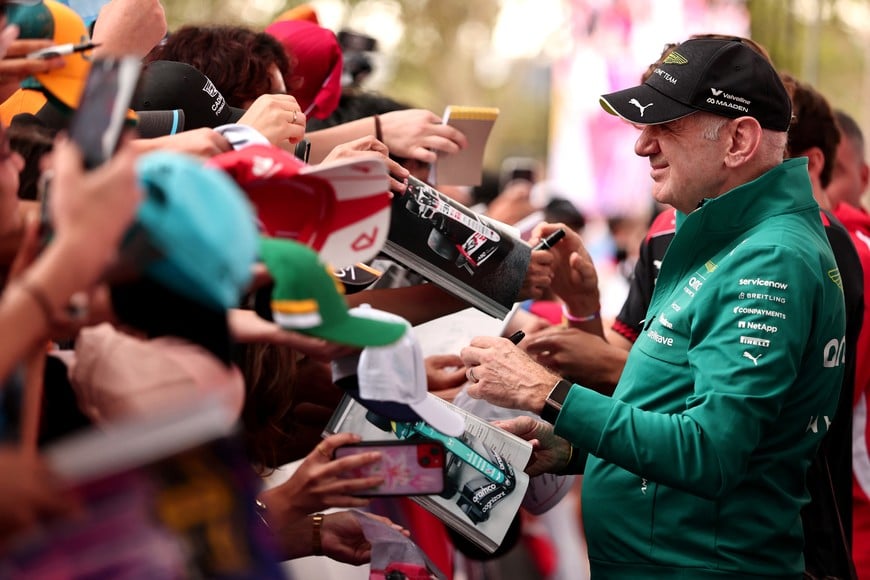 Formula One F1 - Australian Grand Prix - Albert Park Grand Prix Circuit, Melbourne, Australia - March 6, 2026
Aston Martin team principal Adrian Newey with fans before practice REUTERS/Mark Peterson