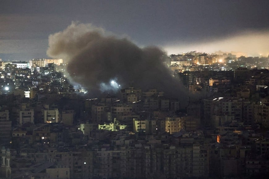 Smoke rises from Beirut's southern suburbs following an Israeli strike, after an escalation between Hezbollah and Israel, amid the U.S.-Israeli conflict with Iran, Lebanon, March 23, 2026. REUTERS/Mohamed Azakir