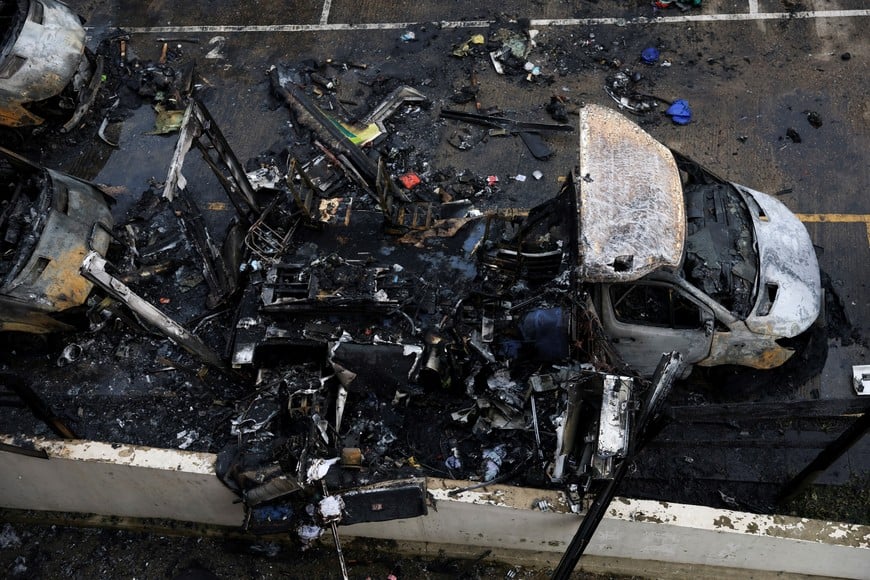 Burnt ambulances, among the four ambulances belonging to Hatzola, a Jewish community organisation, that were set on fire in an incident that the police say is being treated as an antisemitic hate crime, in northwest London, Britain, March 23, 2026. REUTERS/Hannah McKay