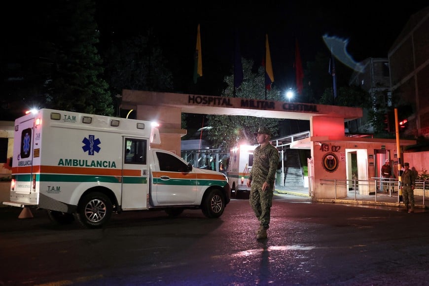 An ambulance arrives at the military hospital carrying people injured in the Colombian Air Force plane crash in Puerto Leguizamo, in Bogota, Colombia, March 23, 2026. REUTERS/Luisa Gonzalez