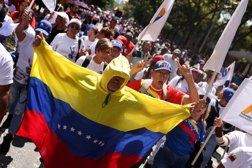 Government supporters participate in a rally led by Venezuela's Interior Minister Diosdado Cabello to call for the lifting of U.S. sanctions on Venezuela, in Caracas, Venezuela March 23, 2026. REUTERS/Leonardo Fernandez Viloria