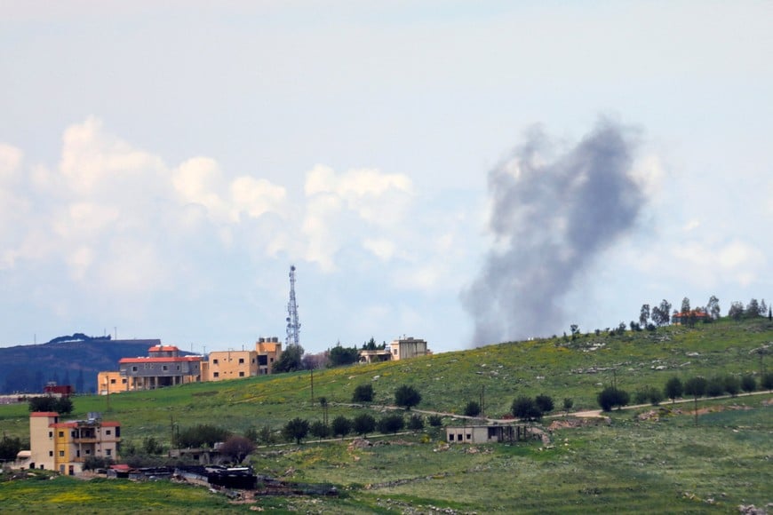 Smoke rises after an Israeli strike, amid escalating hostilities between Israel and Hezbollah, as the U.S.-Israeli conflict with Iran continues, in southern Lebanon, March 25, 2026. REUTERS/Stringer