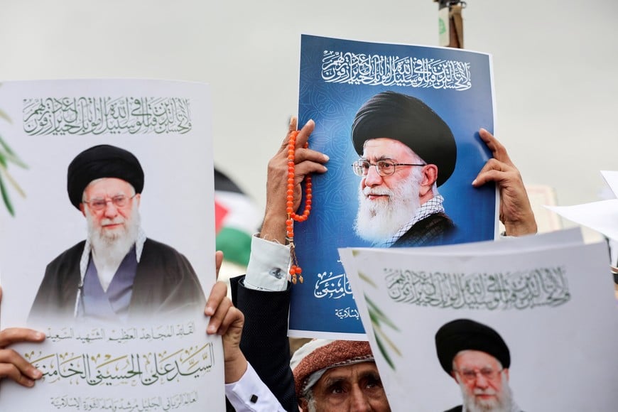 People hold posters featuring pictures of late Iran's Supreme Leader Ayatollah Ali Khamenei during a demonstration by Houthi supporters in solidarity with Iran and Lebanon, amid the U.S.-Israeli conflict with Iran, in Sanaa, Yemen March 6, 2026. REUTERS/Khaled Abdullah