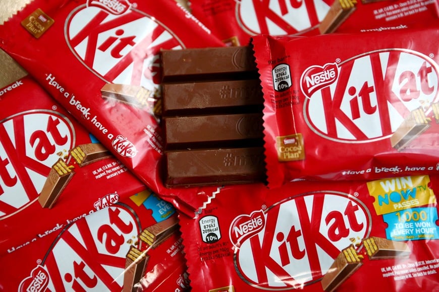 FILE PHOTO: Kit Kat chocolate covered wafer bars manufactured by Nestle are seen in London, Britain, July 25, 2018. REUTERS/Hannah McKay/Photo Illustration/File Photo
