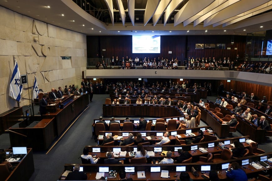 Argentine President Javier Milei speaks during a Plenum session of the Knesset, Israel's Parliament, in Jerusalem, June 11, 2025 REUTERS/Ronen Zvulun