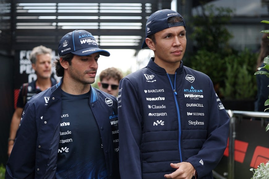 Formula One F1 - Australian Grand Prix - Albert Park Grand Prix Circuit, Melbourne, Australia - March 7, 2026
Williams' Carlos Sainz Jr. and Alexander Albon arrive REUTERS/Hollie Adams
