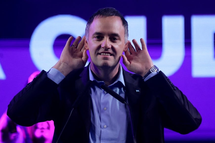FILE PHOTO: Argentina's presidential spokesperson Manuel Adorni gestures during a rally in Buenos Aires, Argentina, May 14, 2025. REUTERS/Tomas Cuesta/File Photo