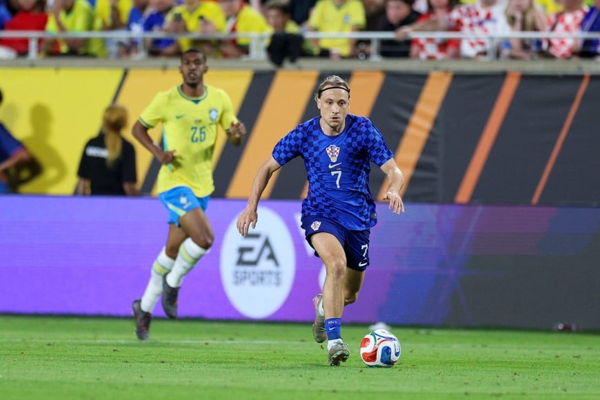 Mar 31, 2026; Orlando, Florida, USA; Croatia midfielder Lovro Majer (7) controls the ball against Brazil in the second half during an international friendly at Camping World Stadium. Mandatory Credit: Nathan Ray Seebeck-Imagn Images