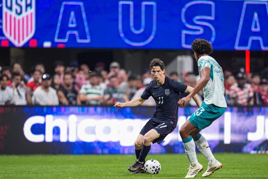Mar 31, 2026; Atlanta, Georgia, USA; United States forward Brenden Aaronson (11) controls the ball against Portugal at Mercedes-Benz Stadium. Mandatory Credit: Dale Zanine-Imagn Images