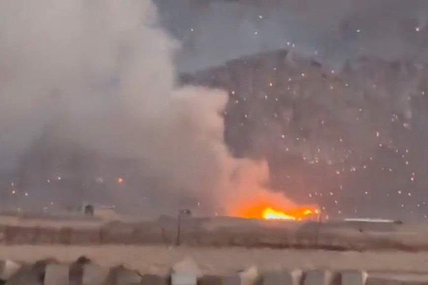 Smoke rises following a reported strike, as burning debris litters the surrounding area, amid the U.S.-Israeli conflict with Iran, in Baharestan, Isfahan province, Iran in this screengrab taken from a social media video released on April 1, 2026. SOCIAL MEDIA/via REUTERS  THIS IMAGE HAS BEEN SUPPLIED BY A THIRD PARTY. NO RESALES. NO ARCHIVES. NEWS USE ONLY.

VERIFICATION:
Road layout and utility poles matched satellite imagery
Shape of the mountains matched topography mapping
Exact date not verified but no older version of the video was found posted online before April 1, 2026
Iranian media reported that there was attack in the area on Wednesday afternoon