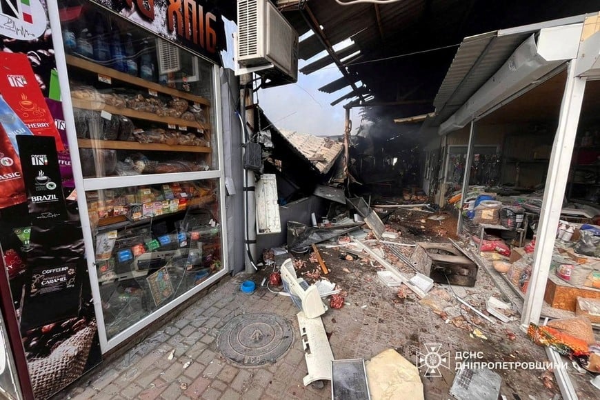 A street market hit by a Russian drone strike, amid Russia's attack on Ukraine, in Nikopol, Ukraine, April 4, 2026. Press service of the State Emergency Service of Ukraine in Dnipropetrovsk region/Handout via REUTERS ATTENTION EDITORS - THIS IMAGE HAS BEEN SUPPLIED BY A THIRD PARTY. LOGO FROM SOURCE. MANDATORY CREDIT. BEST QUALITY AVAILABLE.