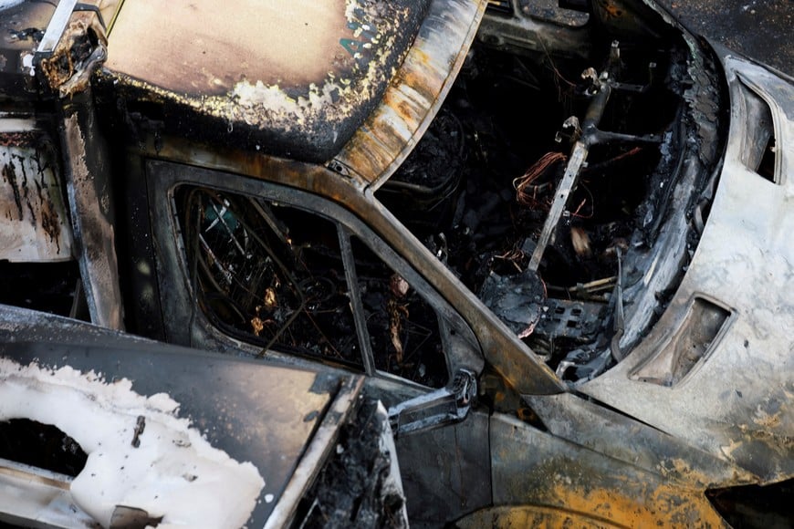 A burnt ambulance, among the four ambulances belonging to Hatzola, a Jewish community organisation, that were set on fire in an incident that the police say is being treated as an antisemitic hate crime, in northwest London, Britain, March 23, 2026. REUTERS/Hannah McKay     TPX IMAGES OF THE DAY