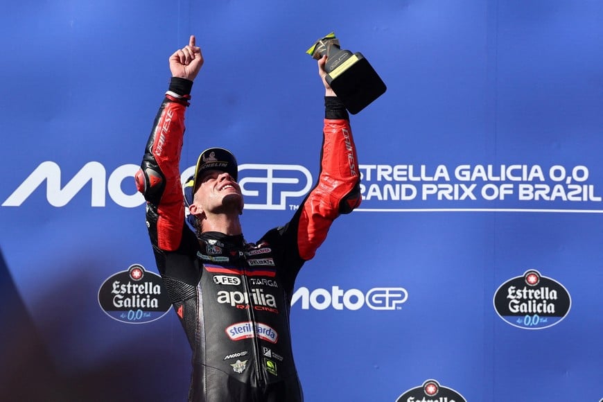 MotoGP - Brazil Grand Prix - Autodromo Internacional Ayrton Senna, Goiania, Brazil - March 22, 2026
Aprilia Racing's Marco Bezzecchi celebrates on the podium after winning the Brazil Grand Prix REUTERS/Adriano Machado TPX IMAGES OF THE DAY