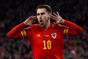 FILE PHOTO: Soccer Football - Euro 2020 Qualifier - Group E - Wales v Hungary - Cardiff City Stadium, Cardiff, Wales, Britain - November 19, 2019  Wales' Aaron Ramsey celebrates scoring their first goal  REUTERS/Rebecca Naden/File Photo
