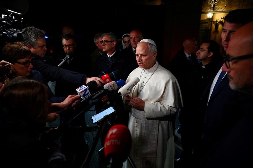 Pope Leo XIV speaks to the media on the U.S.–Israeli conflict with Iran, as he leaves the papal residence to head back to the Vatican, in Castel Gandolfo, Italy, April 7, 2026. REUTERS/Guglielmo Mangiapane