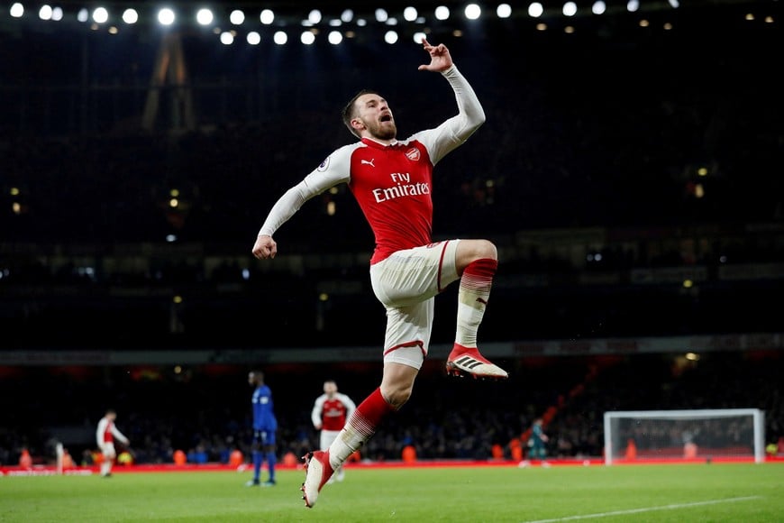 FILE PHOTO: Soccer Football - Premier League - Arsenal vs Everton - Emirates Stadium, London, Britain - February 3, 2018   Arsenal's Aaron Ramsey celebrates scoring their fifth goal to complete his hat-trick    REUTERS/David Klein    EDITORIAL USE ONLY. No use with unauthorized audio, video, data, fixture lists, club/league logos or "live" services. Online in-match use limited to 75 images, no video emulation. No use in betting, games or single club/league/player publications.  Please contact your account representative for further details./File Photo