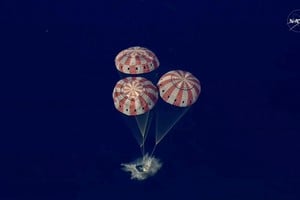 The Artemis II crew capsule splashes down in the Pacific Ocean in this screengrab from a livestream video after the Artemis II crew's flyby of the Moon, April 10, 2026. NASA/Handout via REUTERS THIS IMAGE HAS BEEN SUPPLIED BY A THIRD PARTY