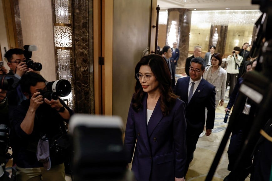 Cheng Li-wun, chairperson of the Kuomintang (KMT), Taiwan's largest opposition party, walks to attend a press conference following her meeting with Chinese President Xi Jinping, in Beijing, China, April 10, 2026. REUTERS/Tingshu Wang