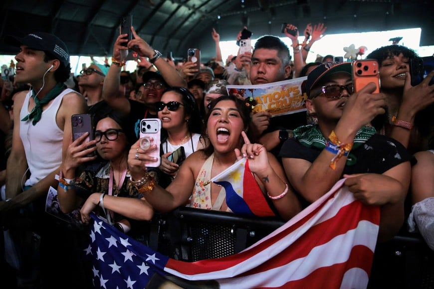 People attend the Coachella Valley Music and Arts Festival in Indio, California, U.S., April 10, 2026. REUTERS/Daniel Cole