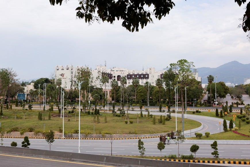 An empty road in front of the Serena Hotel, as delegations from the United States and Iran are expected to hold high-stakes talks in Islamabad, Pakistan, April 11, 2026. REUTERS/Asim Hafeez