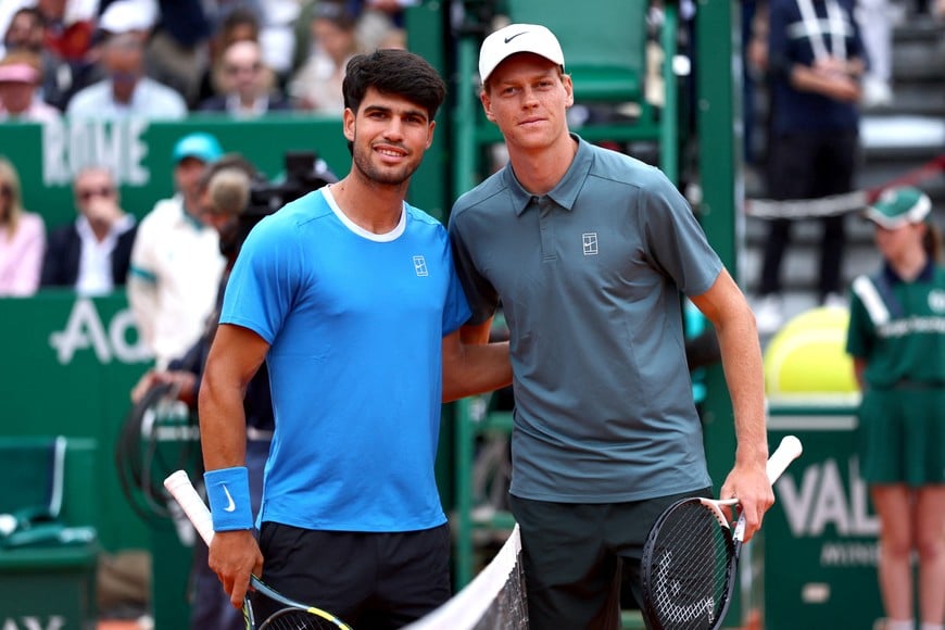 Tennis - ATP Masters 1000 - Monte Carlo Masters - Monte Carlo Country Club, Roquebrune-Cap-Martin, France - April 12, 2026
Spain's Carlos Alcaraz and Italy's Jannik Sinner pose for a photo before their final match REUTERS/Manon Cruz