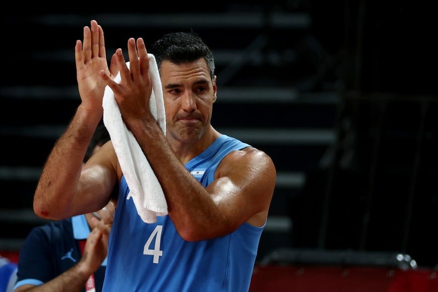 Tokyo 2020 Olympics - Basketball - Men - Quarterfinal - Australia v Argentina - Saitama Super Arena, Saitama, Japan - August 3, 2021. Luis Scola of Argentina applauds at the end of the match REUTERS/Sergio Perez