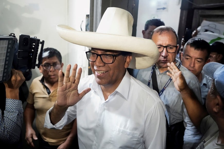 Roberto Sanchez, presidential candidate of the Together for Peru party, attends to speak with members of the media as he waits for the election results after Peru's general election was extended to a second day in some precincts of the capital, in Lima, Peru, April 14, 2026. REUTERS/Angela Ponce