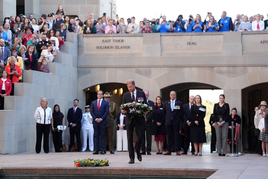 Britain's Prince Harry, the Duke of Sussex walks to lay a wreath during the Last Post Ceremony at the Australian War Memorial in Campbell, Canberra, on day two of the royal trip to Australia, April 15, 2026. Jonathan Brady/Pool via REUTERS TPX IMAGES OF THE DAY
