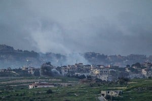 Smoke rises in Lebanon following an Israeli strike, as seen from the Israeli side of the border with Lebanon, April 16, 2026. REUTERS/Florion Goga