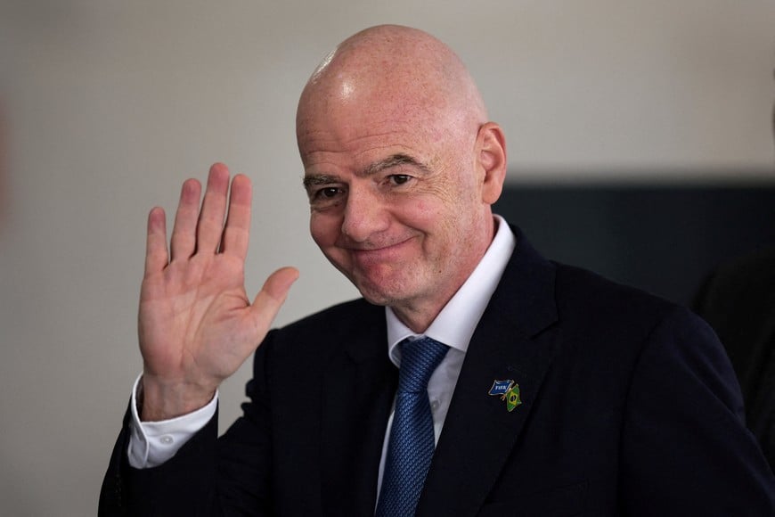 FILE PHOTO: FIFA President Gianni Infantino waves to journalists after a meeting with Brazilian President Luiz Inacio Lula da Silva at the Planalto Palace in Brasilia, Brazil January 26, 2026. REUTERS/Mateus Bonomi/File Photo