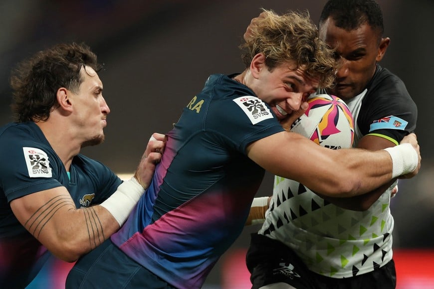 Rugby Union - HSBC Sevens World Championships - Fiji v Argentina - Hong Kong - Kai Tak Sports Park, Hong Kong, China - April 18, 2026
Argentina's Santino Zangara in action with Fiji's Tira Wilagi REUTERS/Tyrone Siu