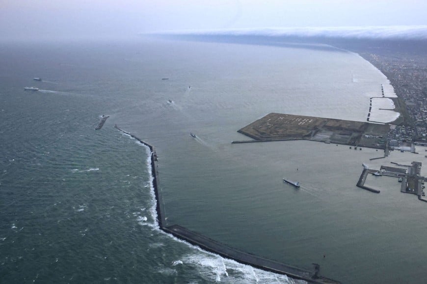 Vessels depart a port in Tomakomai, Hokkaido Prefecture, Japan, where a tsunami warning was issued following an earthquake, April 20, 2026, in this photo taken by Kyodo. Mandatory credit Kyodo/via REUTERS ATTENTION EDITORS - THIS IMAGE WAS PROVIDED BY A THIRD PARTY. EDITORIAL USE ONLY. MANDATORY CREDIT. JAPAN OUT. NO COMMERCIAL OR EDITORIAL SALES IN JAPAN.     TPX IMAGES OF THE DAY