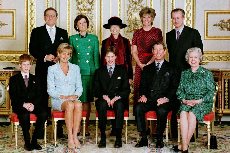 FILE PHOTO: Britain's Prince Harry, Diana, Princess of Wales, Prince William, Charles, Prince of Wales, Queen Elizabeth II, King Constantine of Greece, Lady Susan Hussey, Princess Alexandra, Natalia Grosvenor, the Duchess of Westminster, and Lord Romsey pose for an official portrait in the white drawing room at Windsor Castle, Britain, March 9, 1997, after Prince William's confirmation at St Georges Chapel.  Pool via REUTERS/File Photo