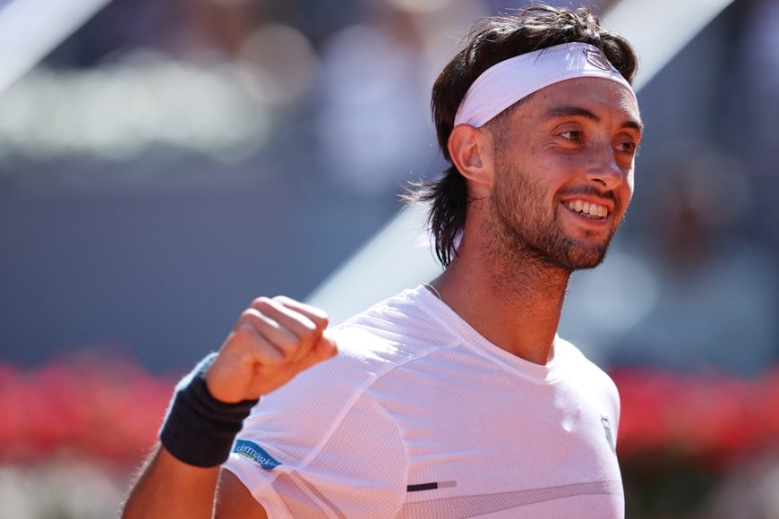 Tennis - Madrid Open - Park Manzanares, Madrid, Spain - April 22, 2026
Argentina's Thiago Agustin Tirante celebrates winning his round of 128 match against Spain's Roberto Bautista Agut REUTERS/Isabel Infantes