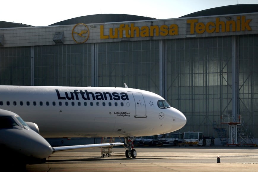 An aircraft of German air carrier Lufthansa parks at the Berlin Brandenburg Airport in Schoenefeld, Germany, April 21, 2026. REUTERS/Lisi Niesner