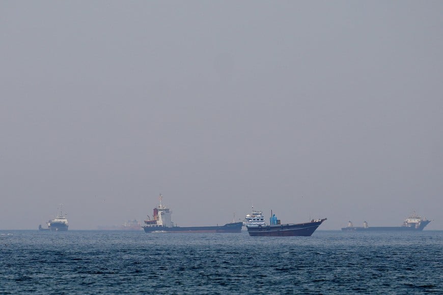 FILE PHOTO: Ships and boats in the Strait of Hormuz off the coast of Musandam, Oman, April 20, 2026. REUTERS/File Photo