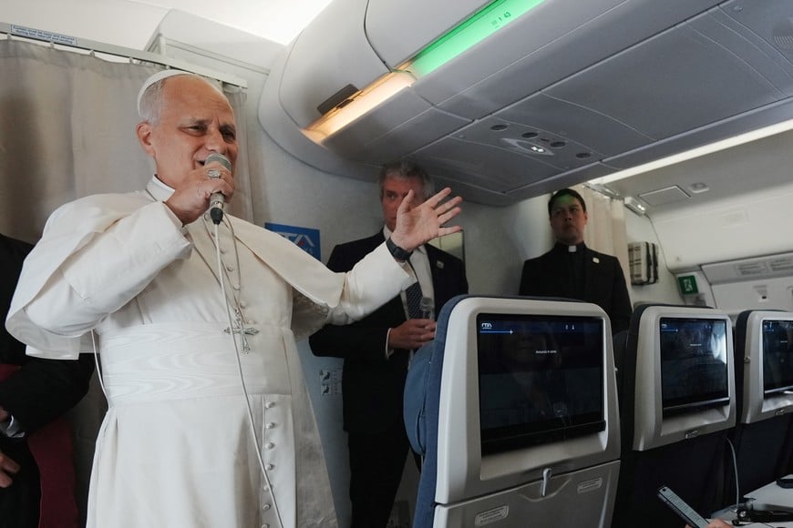 Pope Leo XIV speaks to journalists aboard the papal flight from Malabo to Rome, April 23, 2026, at the end of his 11-day pastoral visit to Africa.     Andrew Medichini/Pool via REUTERS