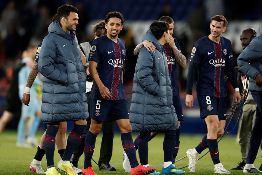 Soccer Football - Ligue 1 - Paris St Germain v FC Nantes - Parc des Princes, Paris, France - April 22, 2026
Paris St Germain's Marquinhos, Goncalo Ramos and Fabian Ruiz celebrate after the match REUTERS/Benoit Tessier